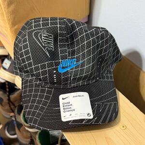 Nike Black Cap with Blue Logo and Grid Pattern